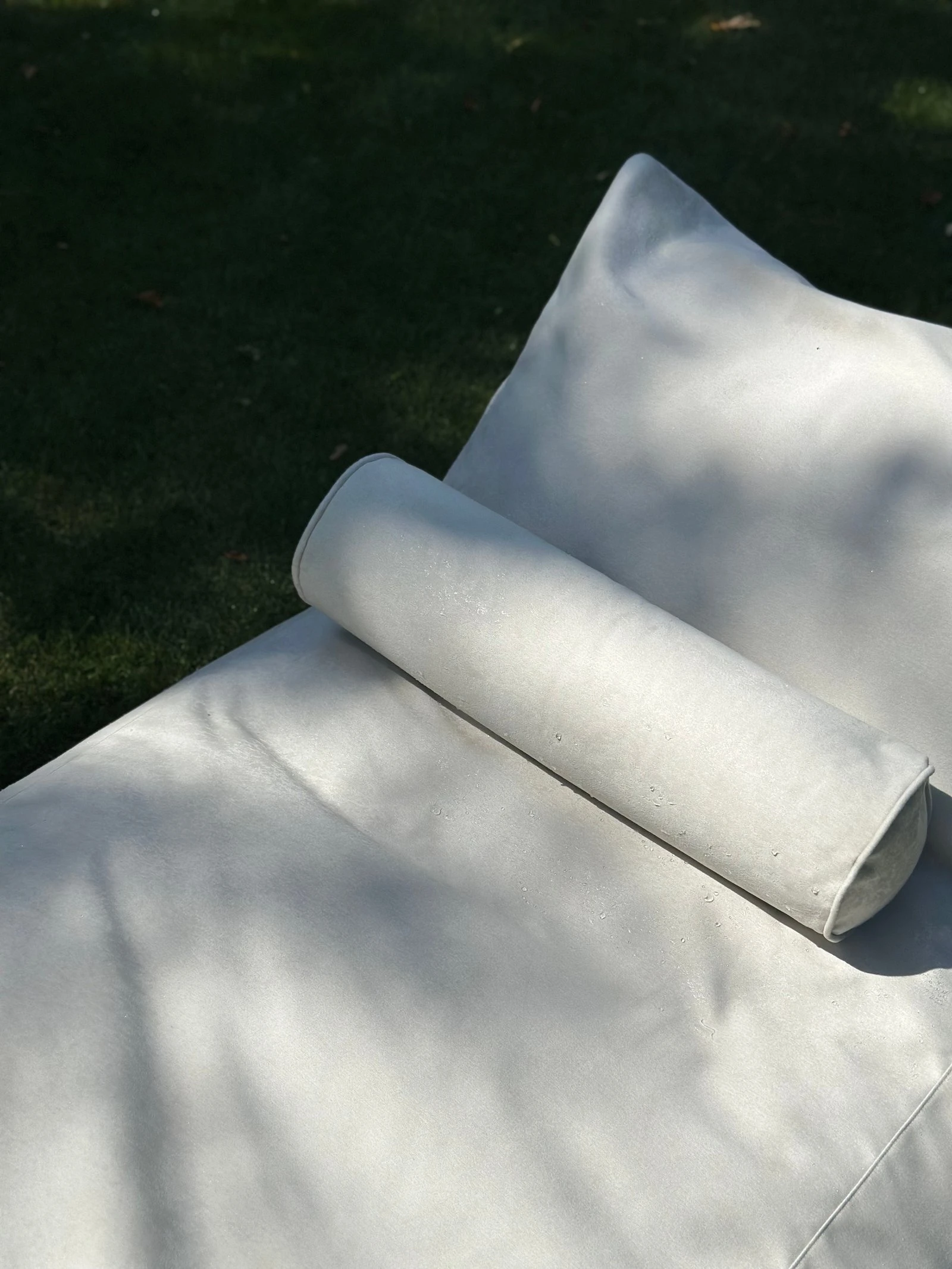 Close detail of the Marolla bolster pillow