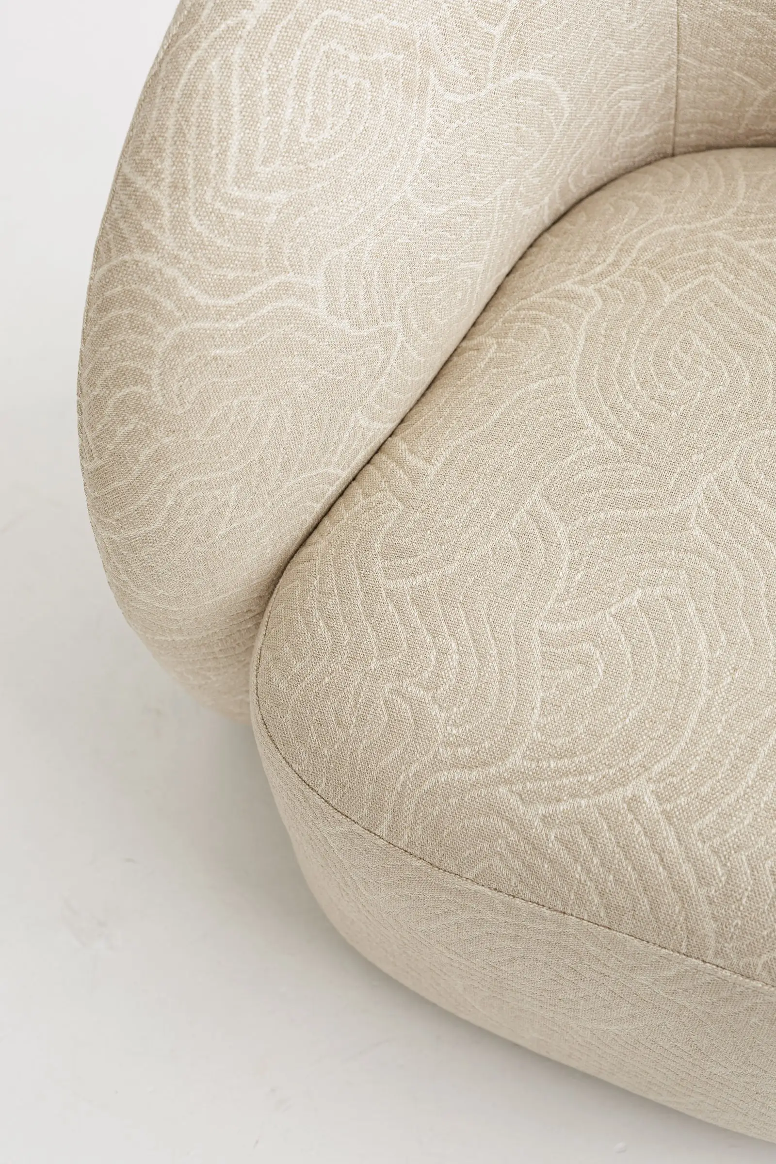 Close detail of the Argile 193003 abstract pattern weave on the Nuba arm