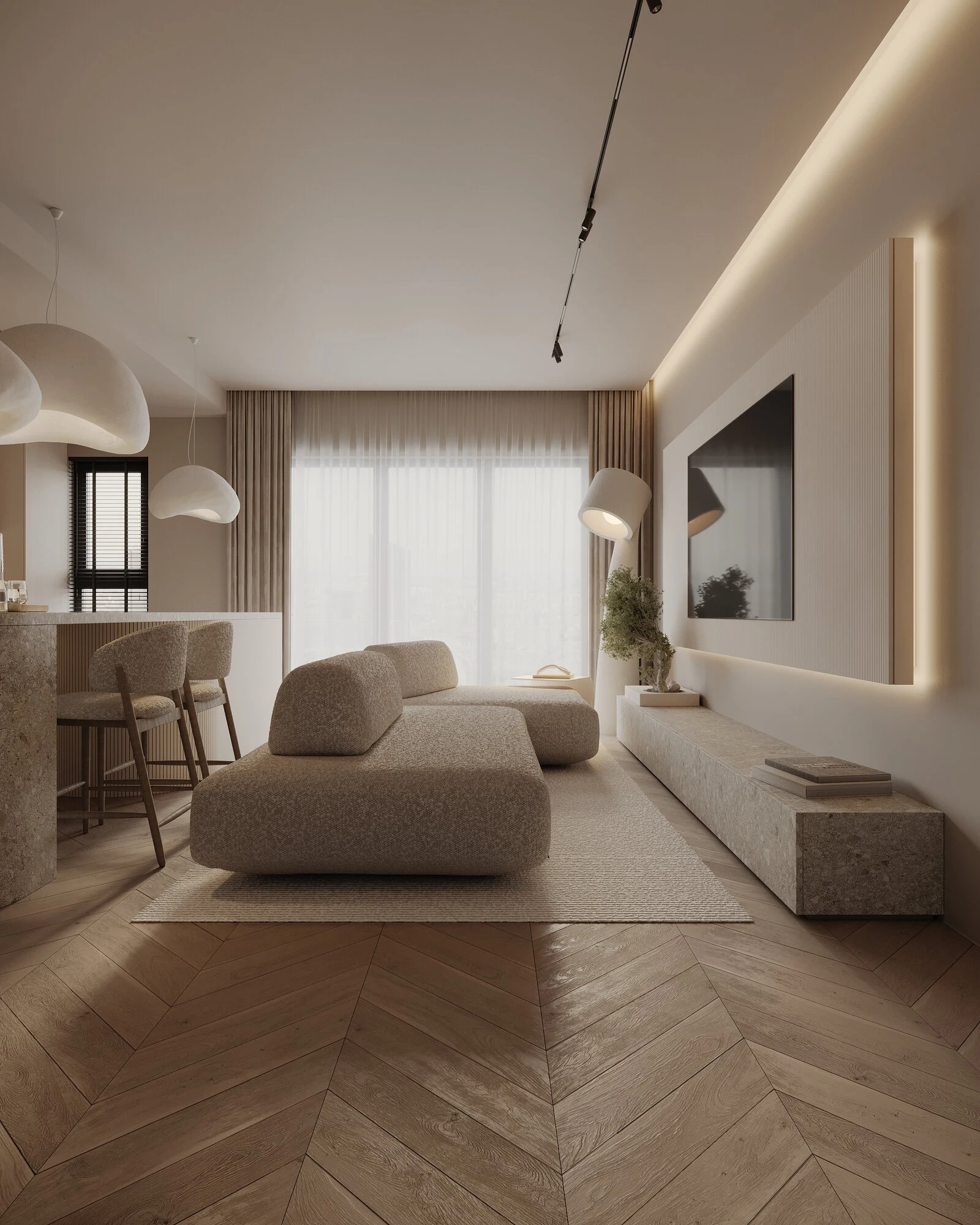 Cream Deseda in a long apartment with oak chevron floor, sculptural cream pendants and a slim stone media wall