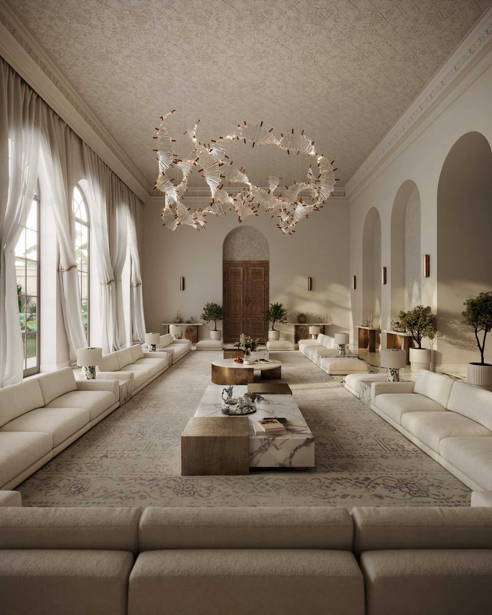 Long majlis with cream Palermos facing across, looking down the central axis toward a wood door and painting