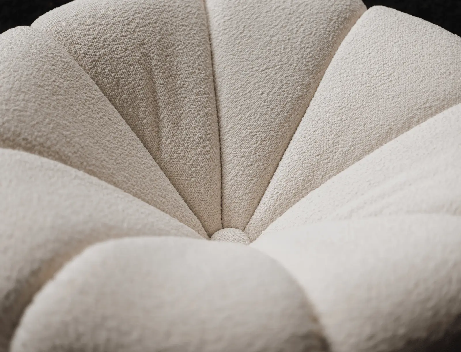 Top-down macro of the Flora back showing the scalloped petals radiating from a central seam