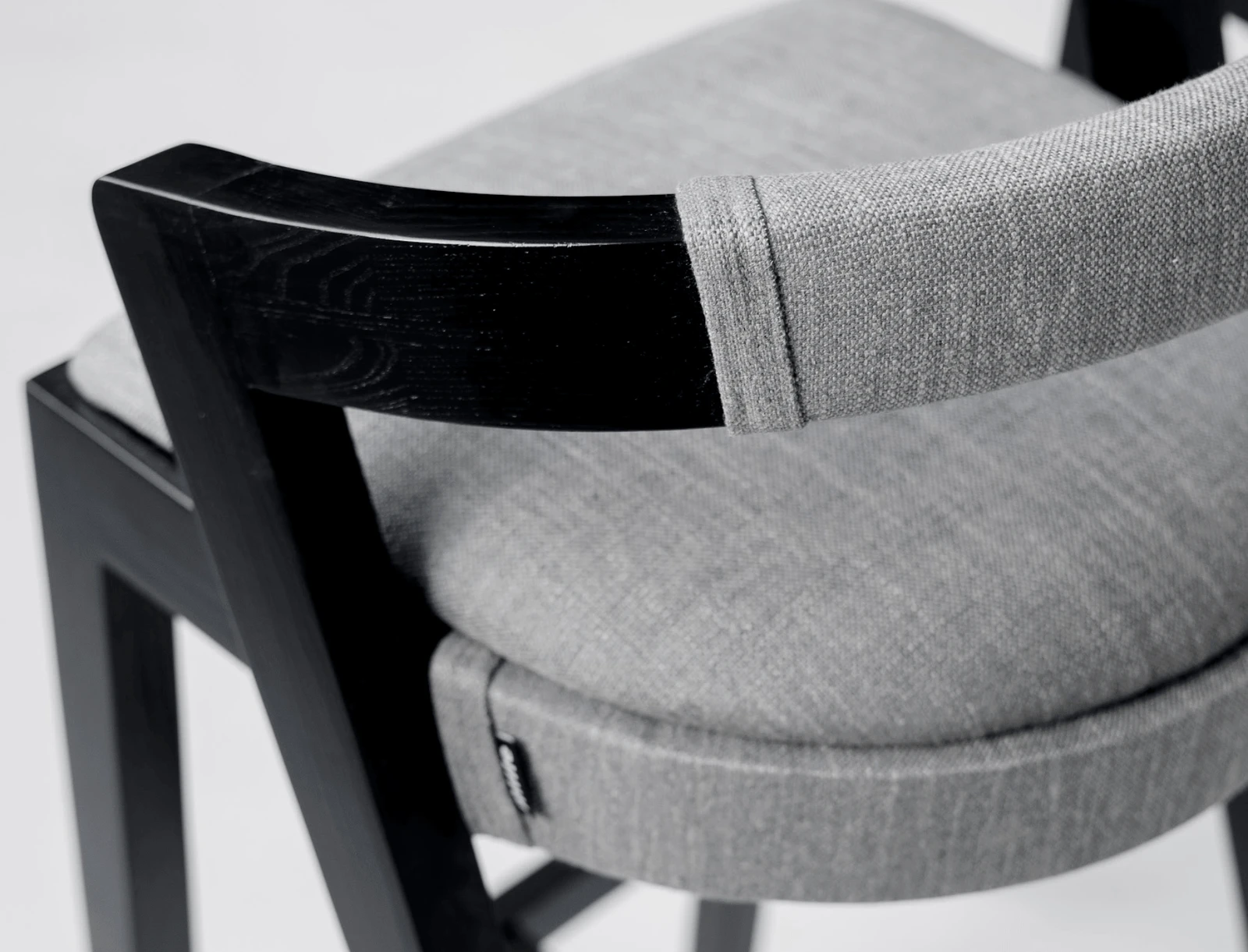 Close detail of the Baffi round upholstered seat in the studio